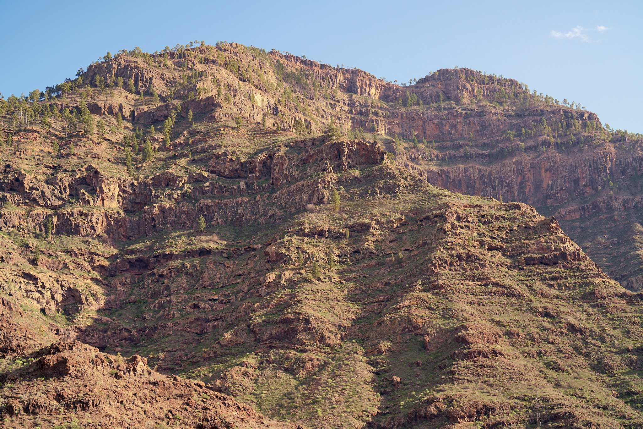 Late afternoon light hitting the peaks as you trek toward the Presa de las Niñas area.
